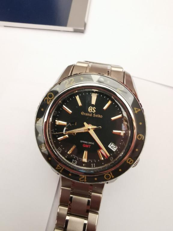 Grand Seiko SBGE215 Spring Drive GMT (titantium), Luxury, Watches on  Carousell
