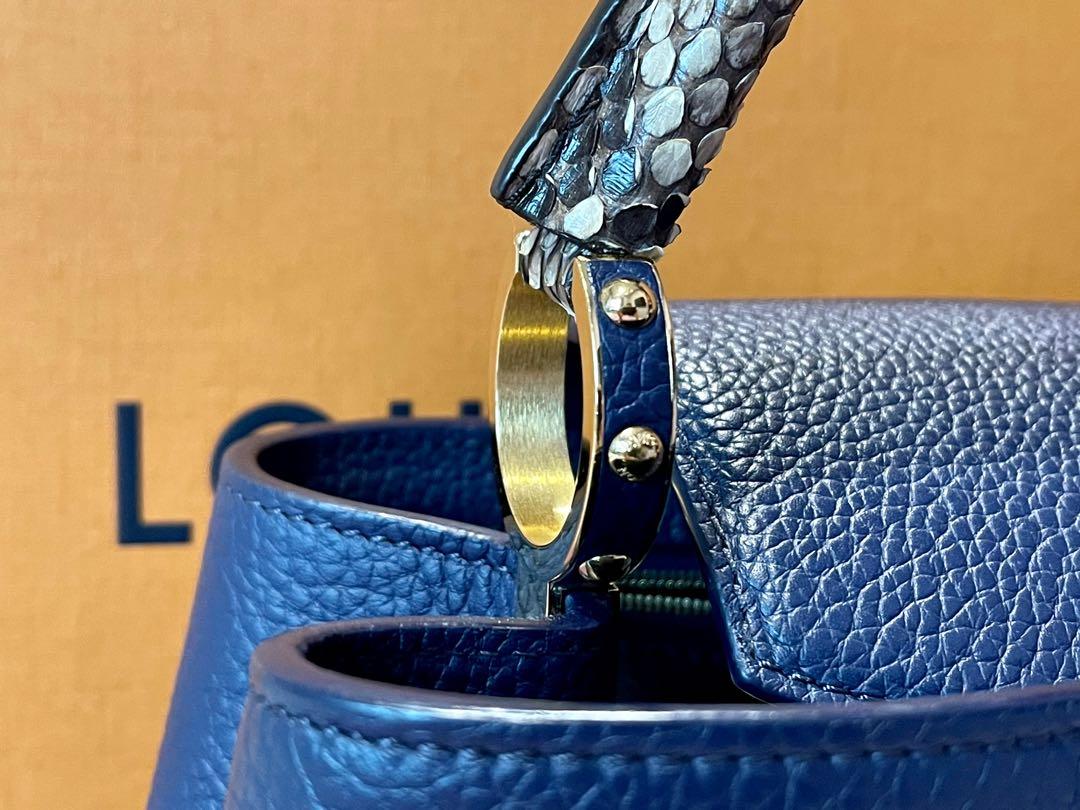 Boîte chapeau souple python crossbody bag Louis Vuitton Multicolour in  Python - 25093192
