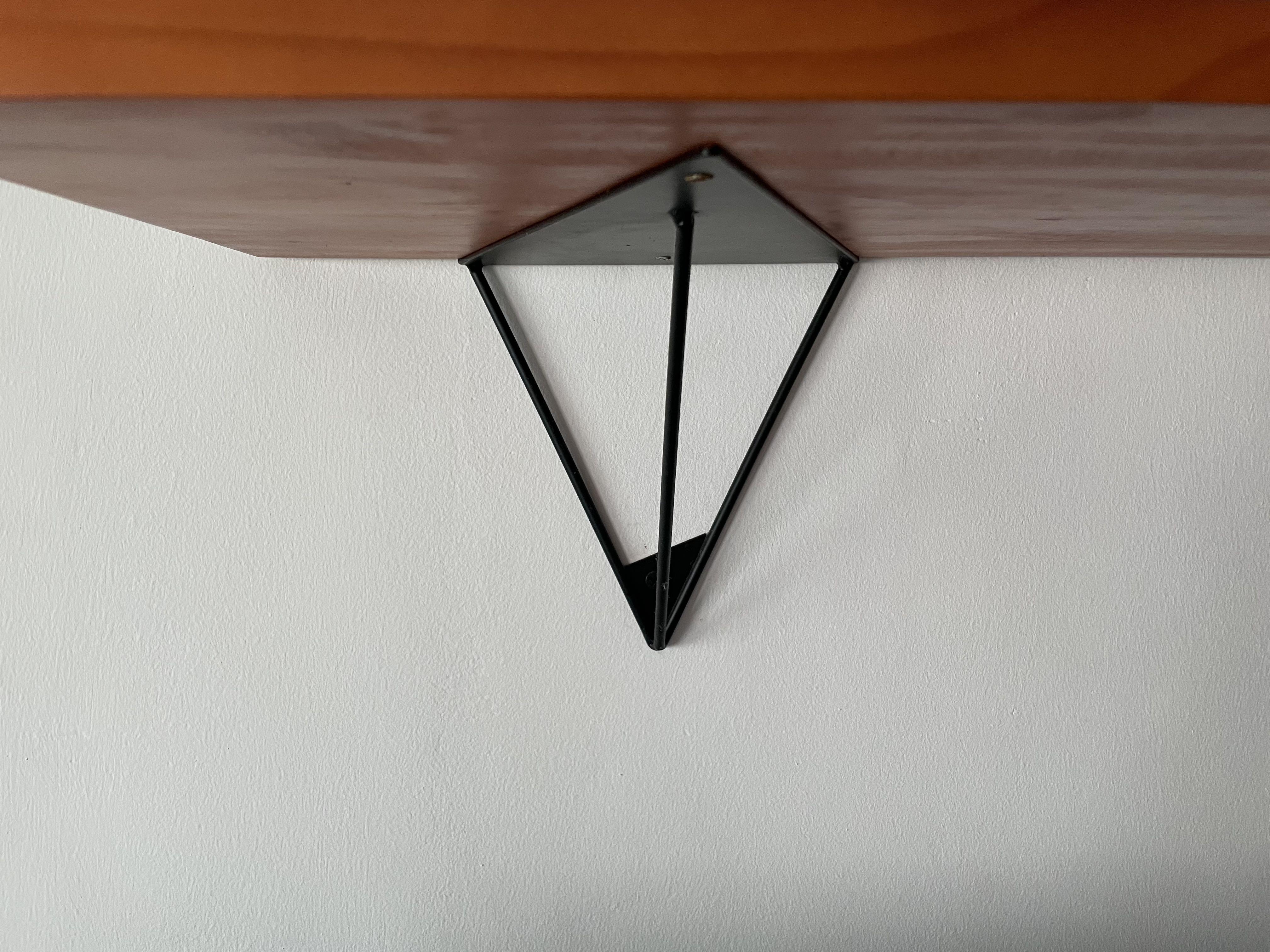 Modern Triangular Shelf Brackets (Category: Shelves, Cabinets & Racks) located in Singapore. Submitted by superliver (Listing ID 1087595074, Image 2). Description: 2 small size brackets (see built in sample in pictures), and 1 bigger size in stock. $3 per small bracket, $5 for big bracket. Fast deal $10 for all 3..