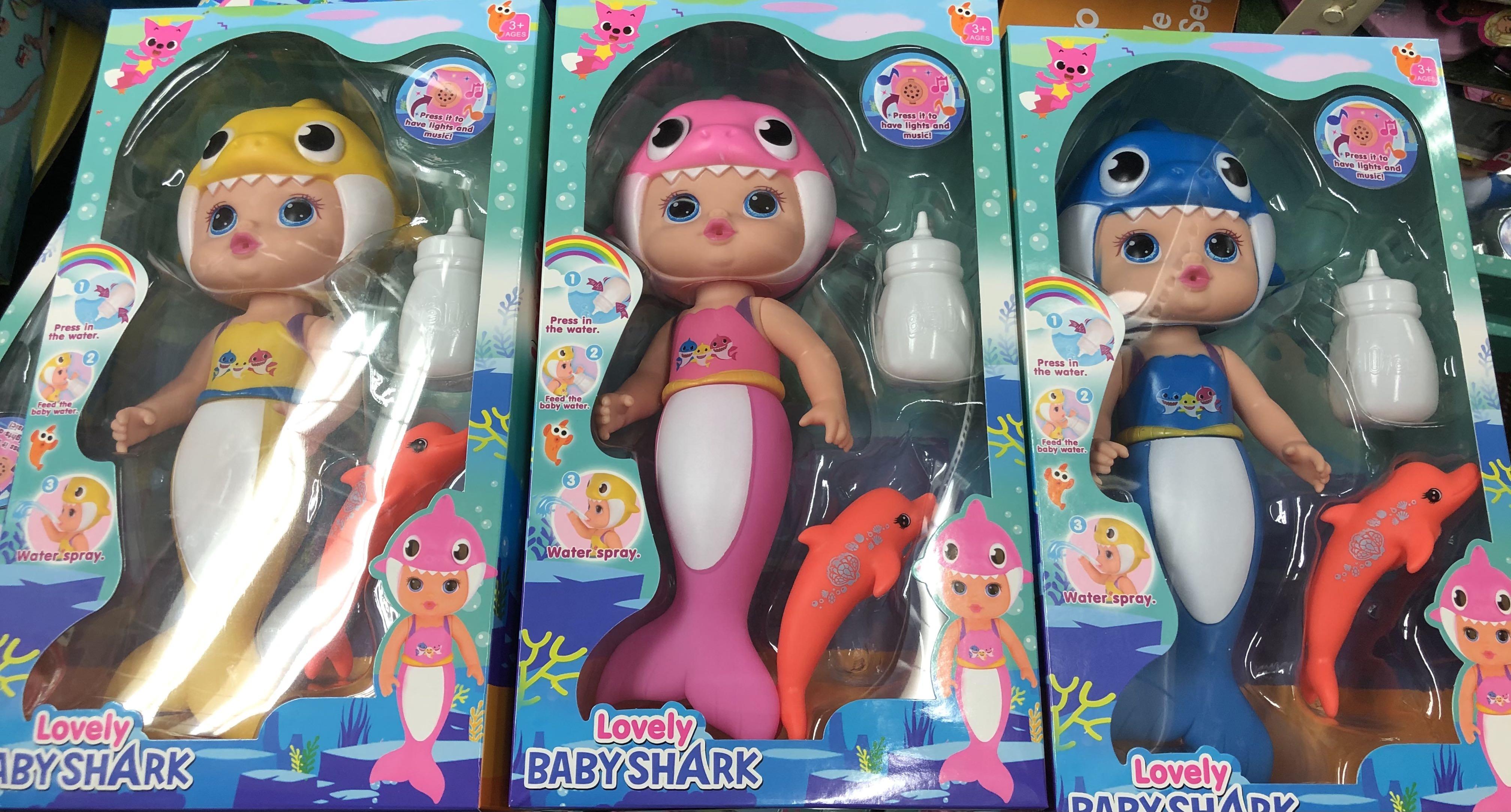 Baby shop shark doll