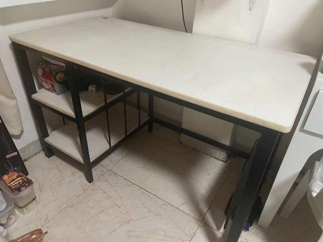 Working studying table STURDY solid metal base white laminated wood on top (Category: Office Furniture & Fixtures) located in Malabon City. Submitted by djstoree (Listing ID 1087864337, Image 1). Description: 48.3 inches width 24.2 inches length 28.7 height Last price already .
