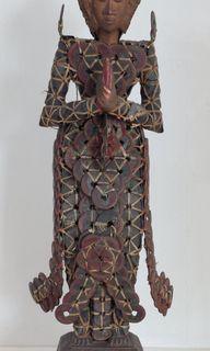 An old Balinese Chinese coins statue
