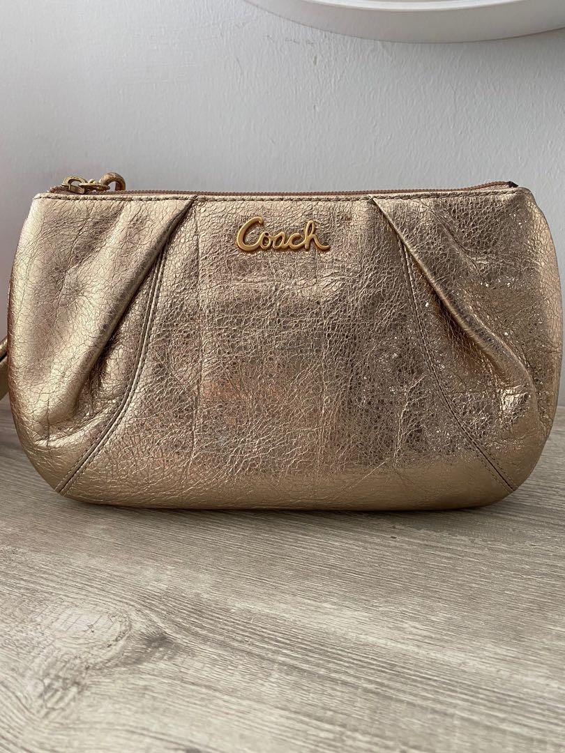 Brand new Coach golden clutch
