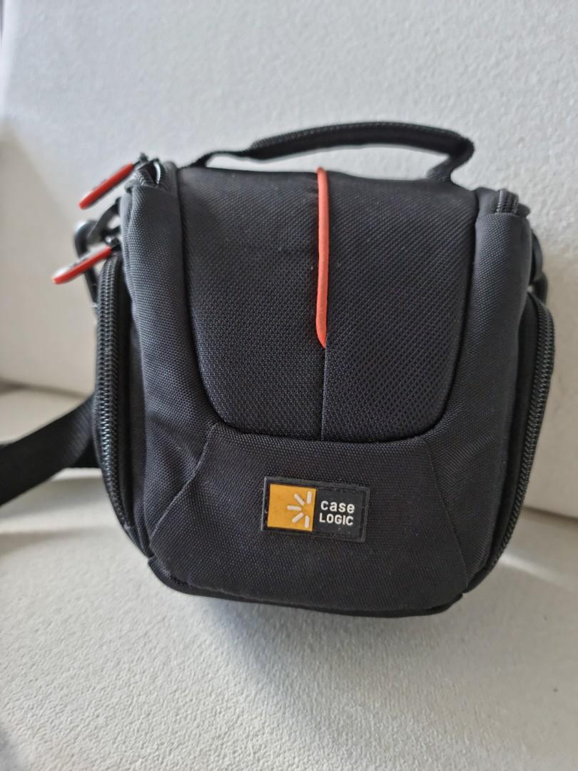 Case Logic Camera Bag (Category: Camera Bags & Carriers) located in Pasig City. Submitted by shedecluttrs (Listing ID 1087894566, Image 1). Description: - Case Logic DCB-304A Compact System/Hybrid Camera Case (Black) - Slightly used.