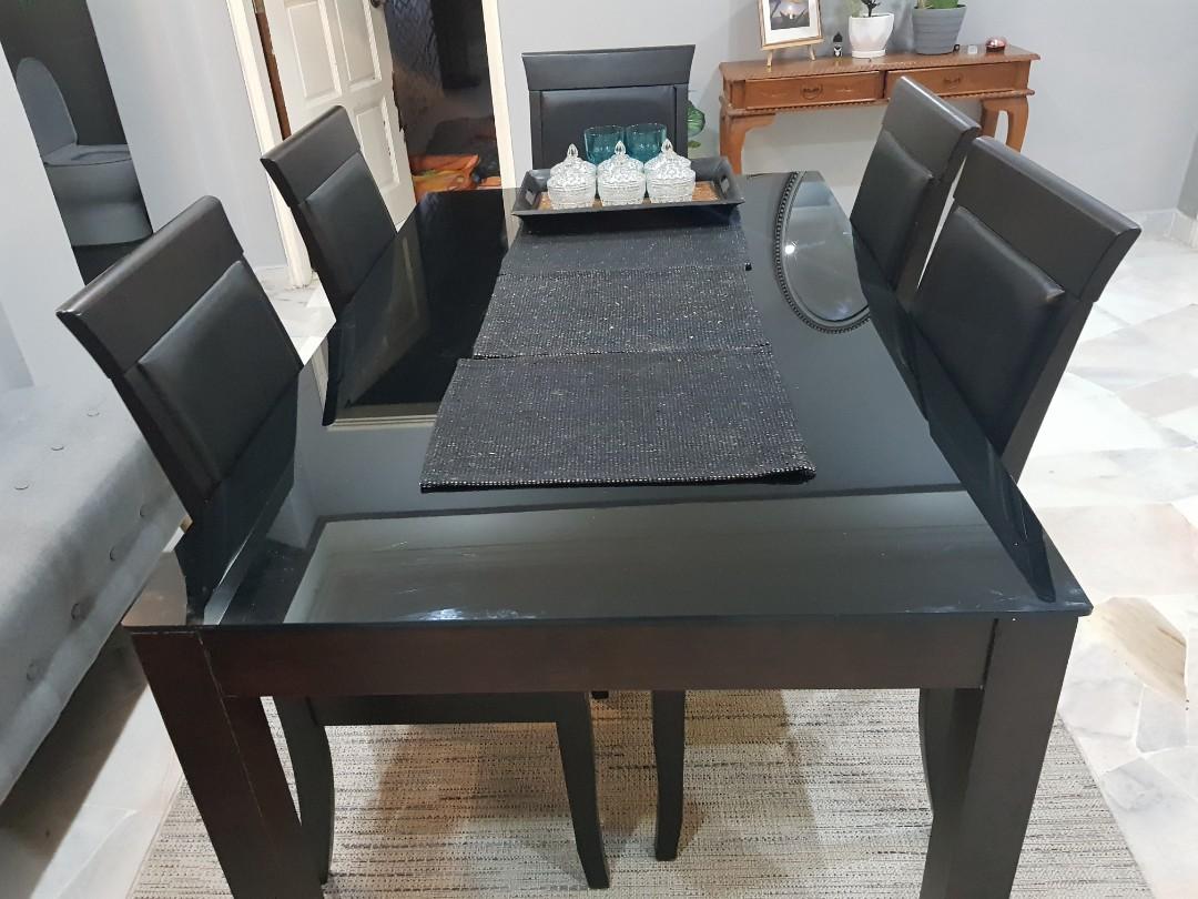 Dining Table Set (Category: Chairs) located in Kuala Lumpur. Submitted by emansobri (Listing ID 1088002810, Image 1). Description: Table Set for sale. 1 Wooden Frame, Glass Top table 6 chairs Condition 6/10 (1 Chair needs to be repair) contact me to arrange delivery (0134826428).