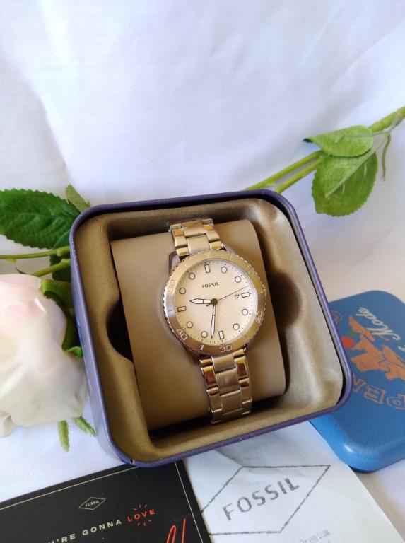 Fossil white online gold watch