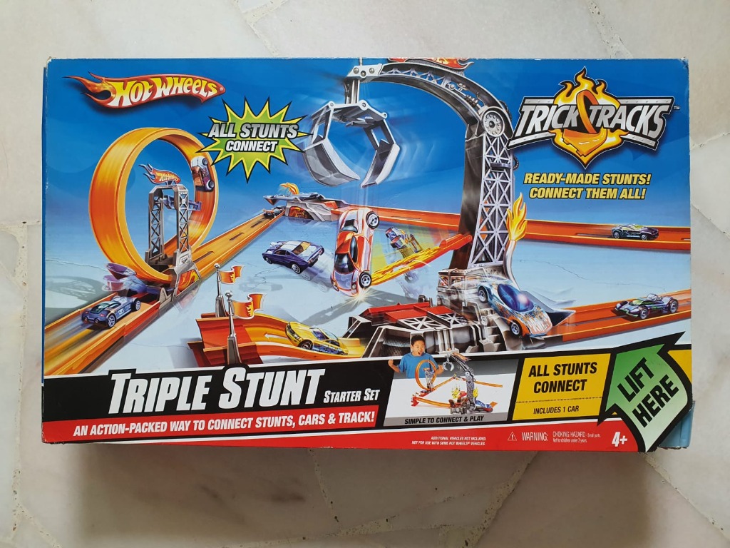 Hot wheels trick tracks hotsell triple stunt starter set