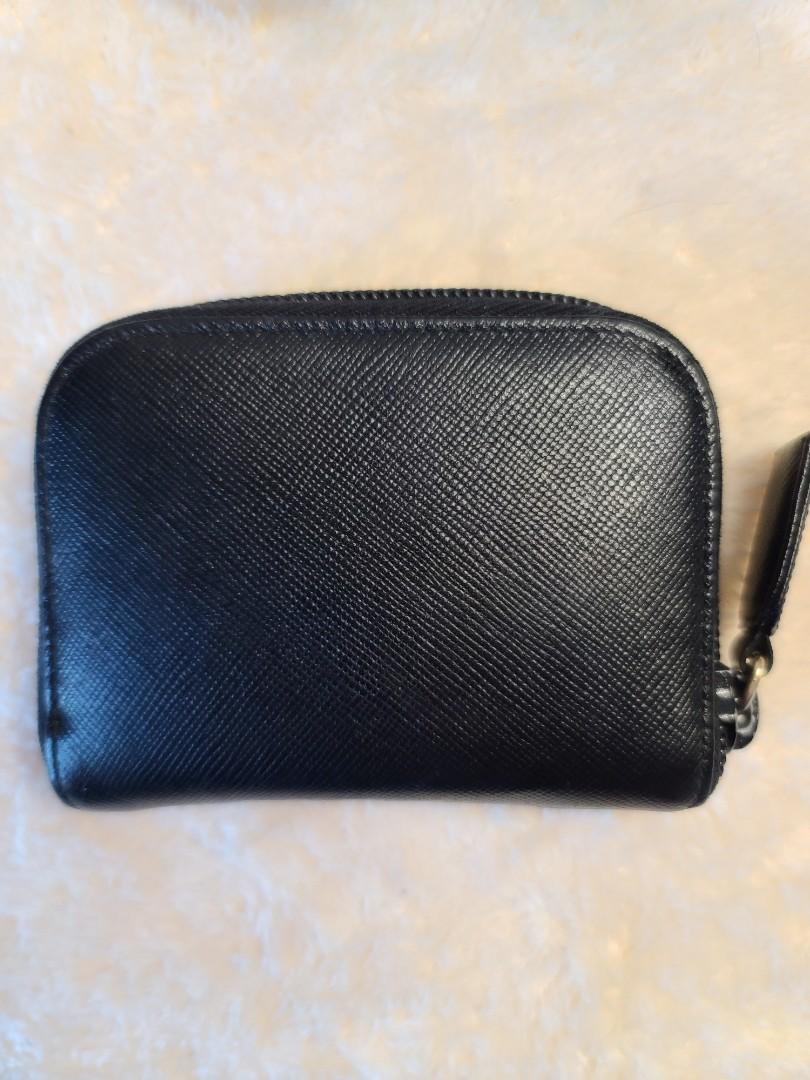 Prada Coin Purse (Category: Luxury Bags & Wallets) located in Manila. Submitted by shoppingspree008 (Listing ID 1087988953, Image 2). Description: This is a preloved Prada Coin Purse. Please see photos to appreciate ♡.