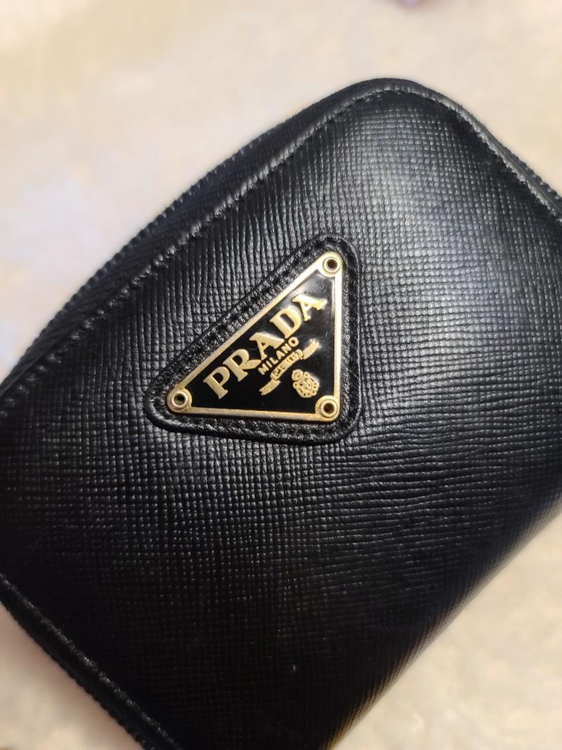 Prada Coin Purse (Category: Luxury Bags & Wallets) located in Manila. Submitted by shoppingspree008 (Listing ID 1087988953, Image 1). Description: This is a preloved Prada Coin Purse. Please see photos to appreciate ♡.