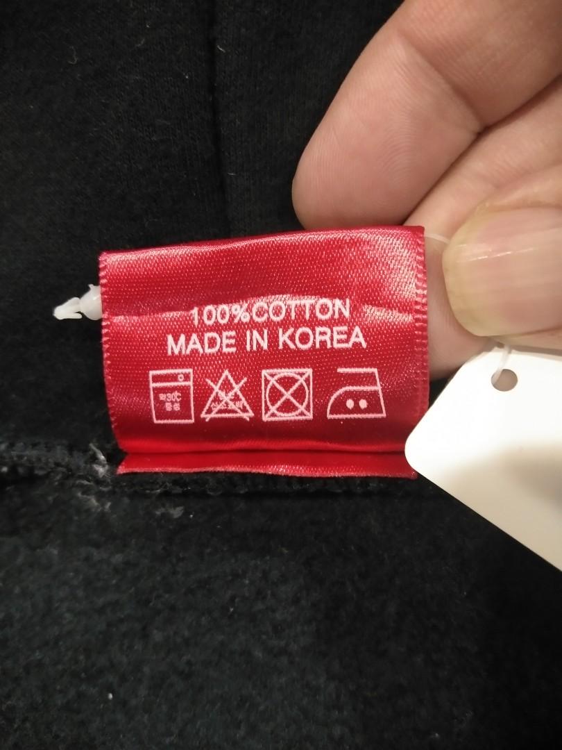 Supreme sweater made in korea label on sale