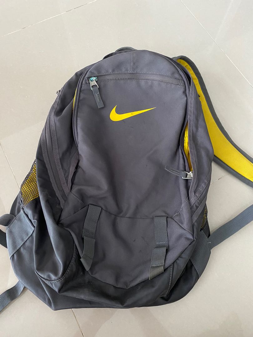 yellow and black nike backpack