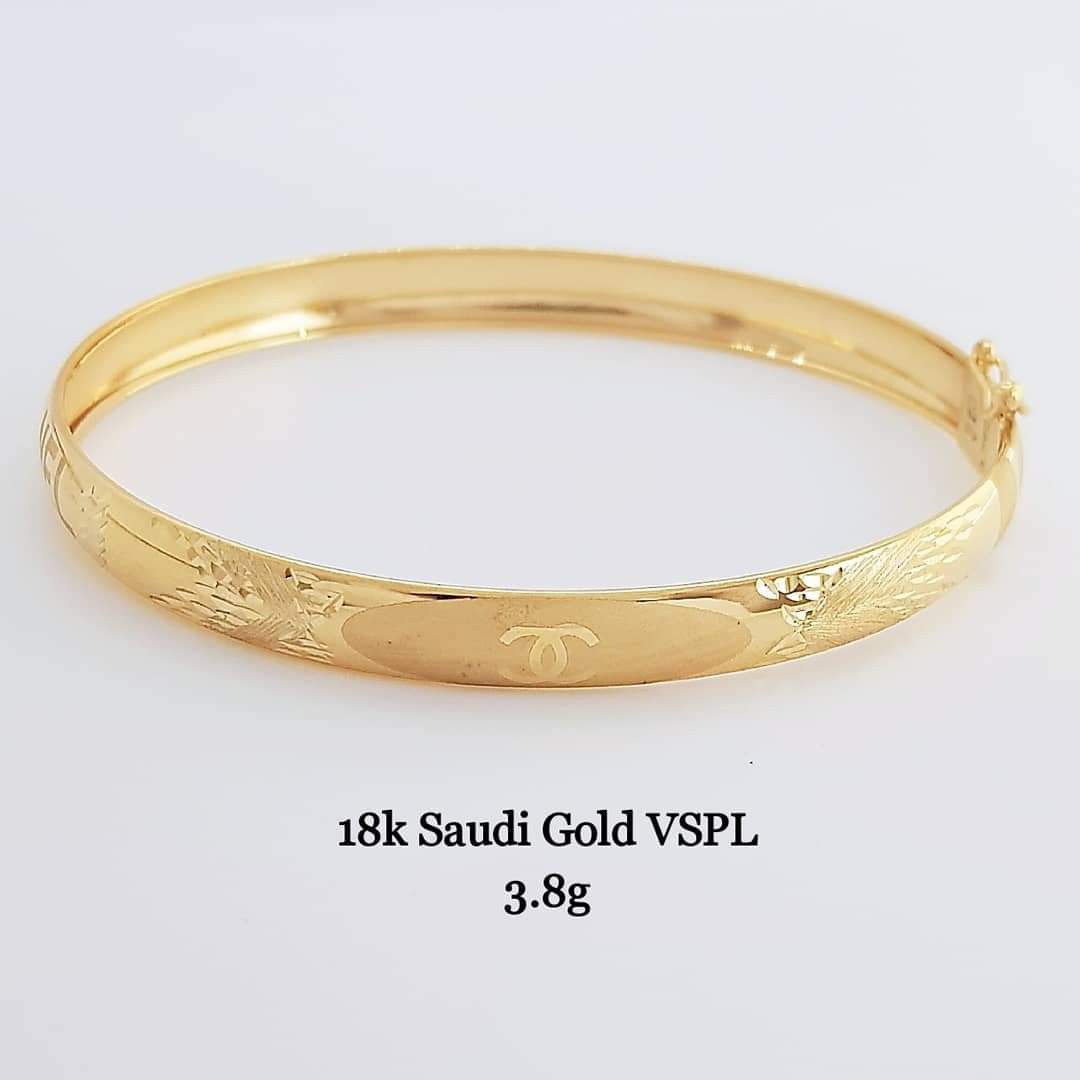 Chanel Gold Metal Cut Out Logo Bangle Bracelet For Sale at 1stDibs  bangles  logo chanel bangles chanel bangle gold