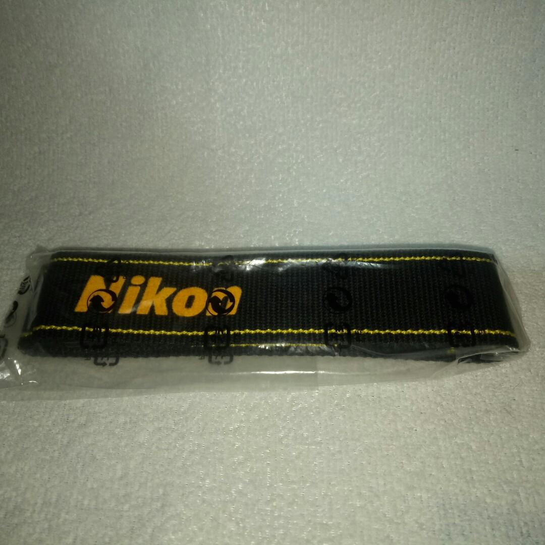 Nikon Neckstrap (Category: Camera Bags & Carriers) located in Quezon City. Submitted by Mr._Vintageous (Listing ID 1088324282, Image 1). Description: For Sale. Brand New Nikon Neckstrap. Never used. Actual pictures posted. Meet up along SM Fairview or nearby places. Ships via Lalamove at buyer's Cost. Payment upon pivk up or thru Gcash. Send Message or text .09397430803 fast transaction..