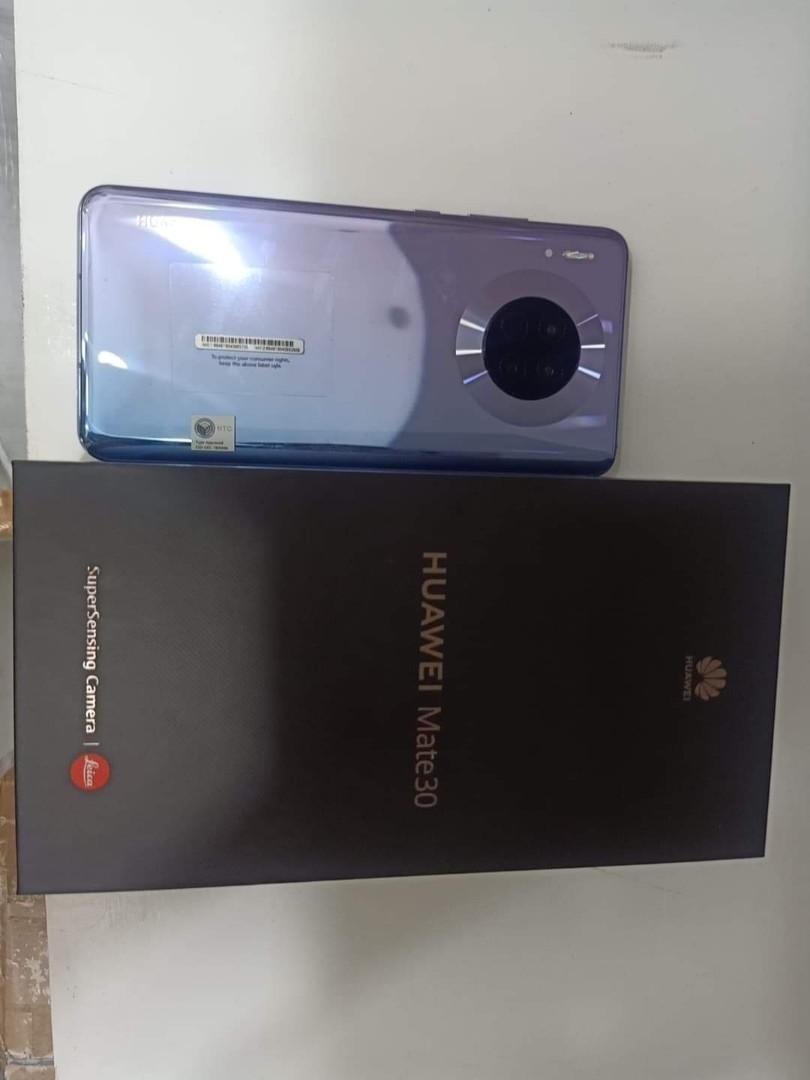 Huawei Mate 30 (Category: Huawei) located in Tuguegarao City. Submitted by jomalyn1997 (Listing ID 1088722953, Image 3). Description: • 128GB Internal Storage / 8GB RAM Memory • Rear Camera: 40 MP (SuperSensing Camera, f/1.8 aperture) + 16 MP (Ultra Wide Angle Camera, f/2.2 aperture) + 8 MP (Telephoto Camera, f/2.4 aperture, OIS) supports Autofocus (phase focus, contrast focus), supports AIS (HUAWEI AI Image Stabilization). • Front Camera: 24 MP,
