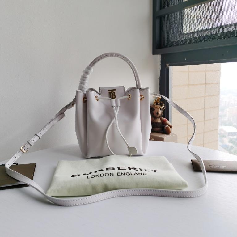 monogram motif canvas and leather bucket bag Medrar Smart Solutions Innovacion y Estrategia