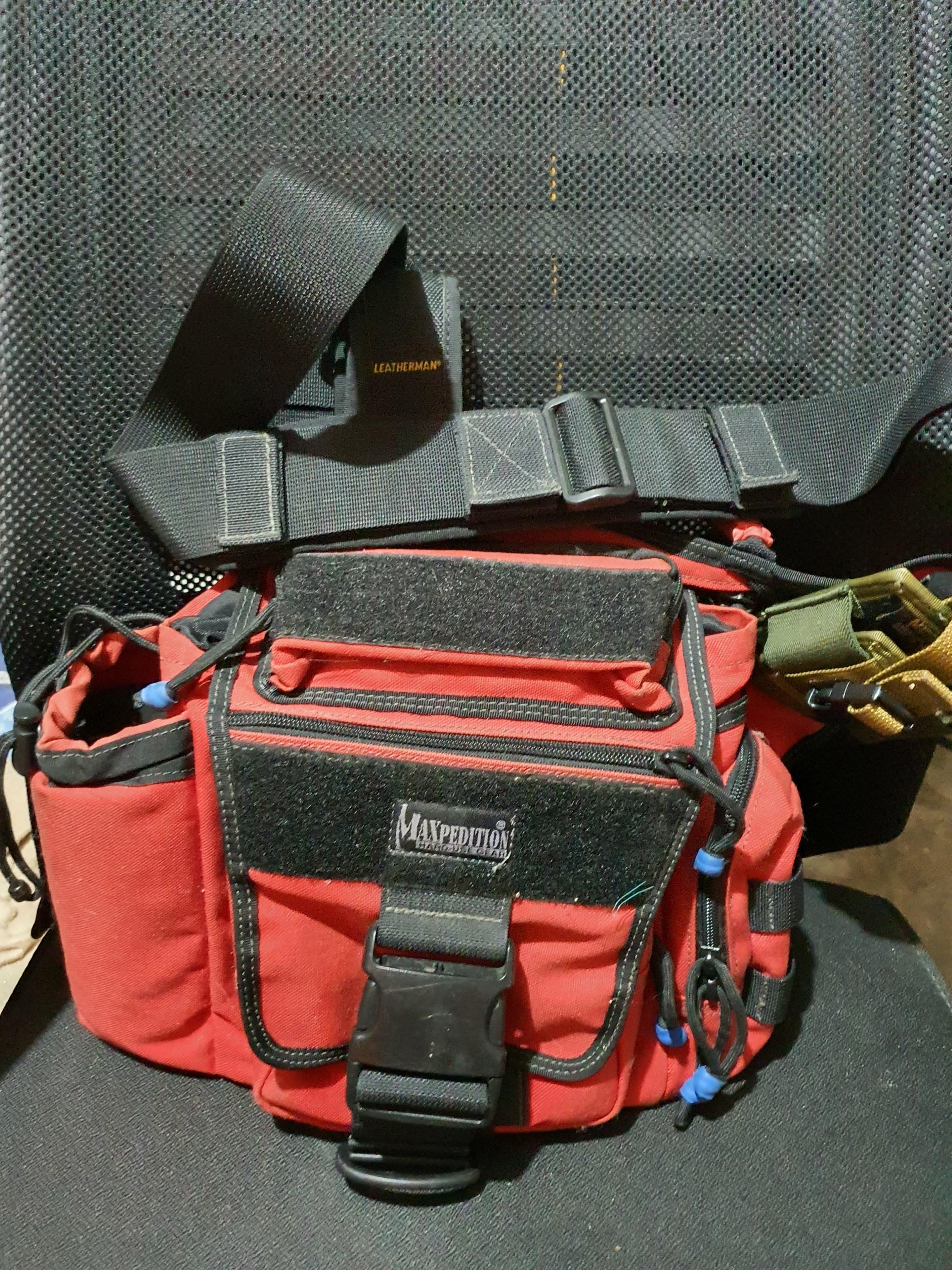 Maxpedition 0412ER Jumbo Versipack, Fire-EMS Red (Category: Sling Bags) located in Quezon City. Submitted by nrthstr (Listing ID 1085235313, Image 2). Description: Maxpedition 0412ER Jumbo Versipack, Fire-EMS Red Pre loved * Almost in pristine condition * Used but never abused * No damages, rips or tears * Leatherman pouch and the green attachment are not part of the sale * Replaced noisy metal zipper pulls with paracord pulls for more efficiency