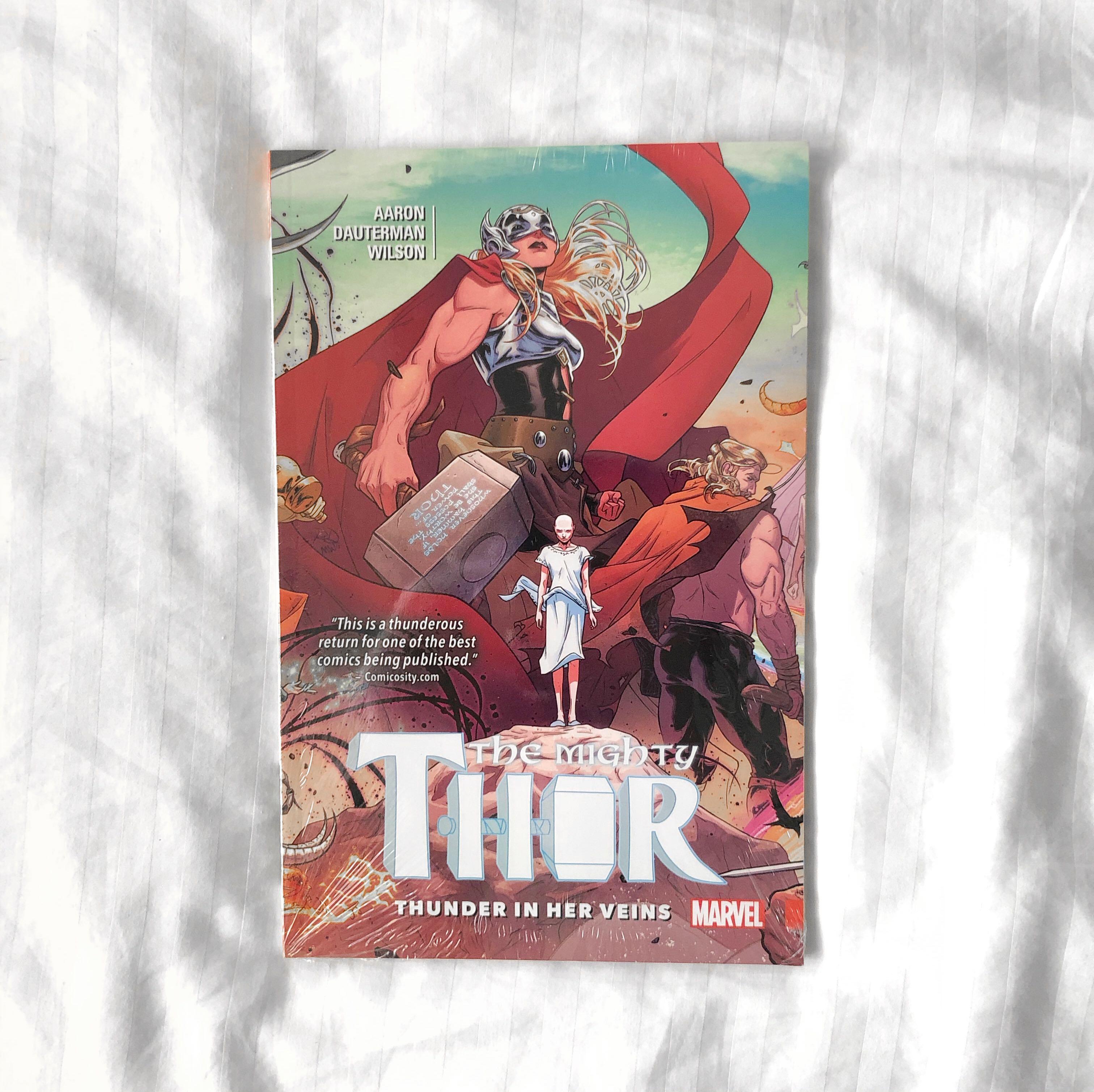 The Mighty Thor Vol 1: Thunder in Her Veins (Category: Comics & Manga) located in Paranaque City. Submitted by rainbrain (Listing ID 1085283410, Image 1). Description: ⚠️PLEASE READ EVERYTHING⚠️ Brand new and sealed. The Mighty Thor Vol 1: Thunder in Her Veins by Jason Aaron and Russell Dauterman 🏷 Prices not inclusive of shipping, delivery fee depends on your selected mode of shipping 🙅🏻‍♂️ No meet-ups. Stay safe! 📦 Delivery via GrabExpress,