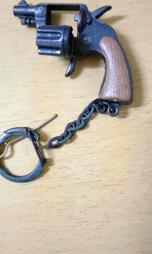 Mini cap outlet gun keychain
