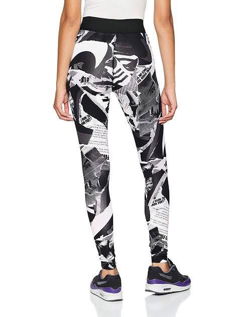 Nike newspaper 2025 leggings