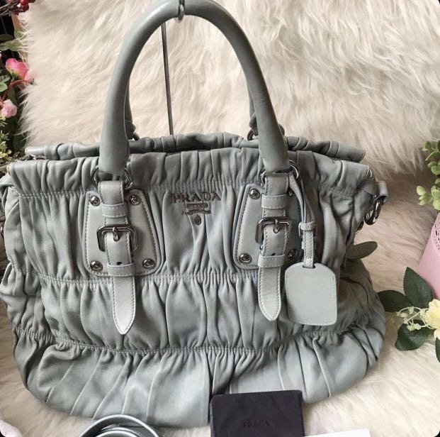Authentic PRADA Gaufre Bag (Category: Luxury Bags & Wallets) located in Cavite. Submitted by karaalexandra (Listing ID 1088736899, Image 1). Description: Authentic PRADA Gaufre Bag Large size With original strap,cards and dust bag. I can accept layaway with no additional charge..