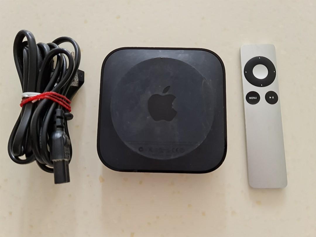Working Apple TV gen 2 (model A1378) with remote, power cables, TV