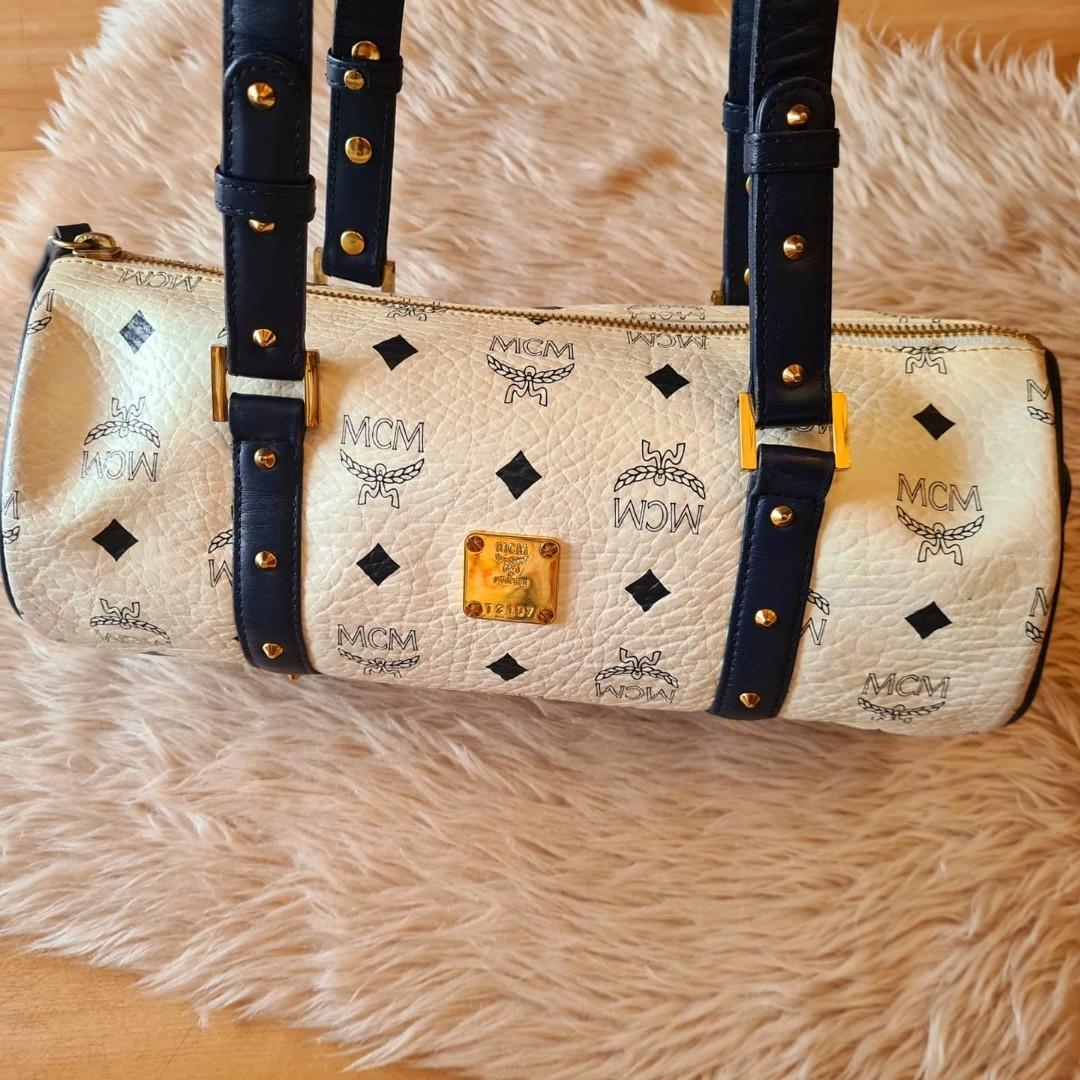 MCM papillon black, Luxury, Bags & Wallets on Carousell