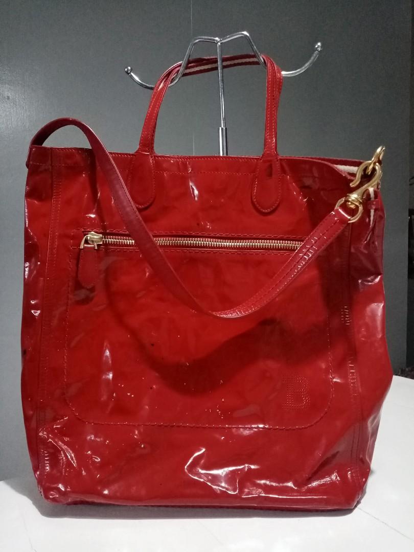 Bally Patent Leather Tote Bag (Category: Luxury Bags & Wallets) located in Cebu City. Submitted by maksipreloveditems (Listing ID 1089005042, Image 1). Description: BALLY Patent Leather Tote Bag Color: Red - EXCELLENT USED CONDITION - Storage marks - Stains - Scratches * Item is in Cebu City. PLEASE READ: Photos posted are FINAL. NO "When Worn Photos" request please. Flaws were mentioned in the description and shown in the pictures posted. Dimens