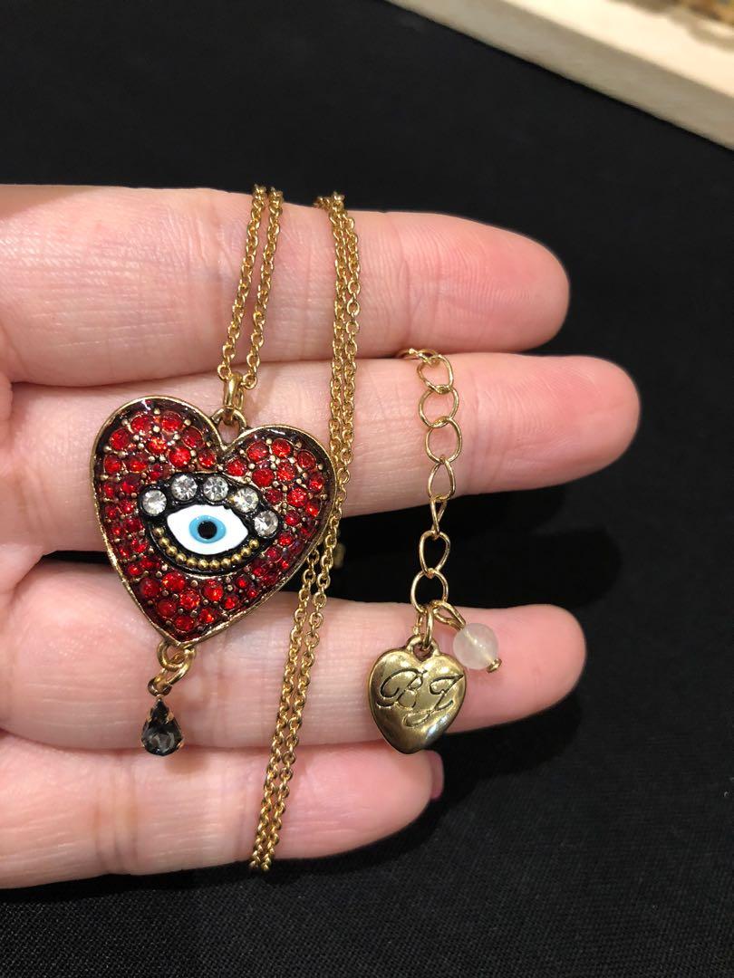 Betsey johnson top evil eye earrings