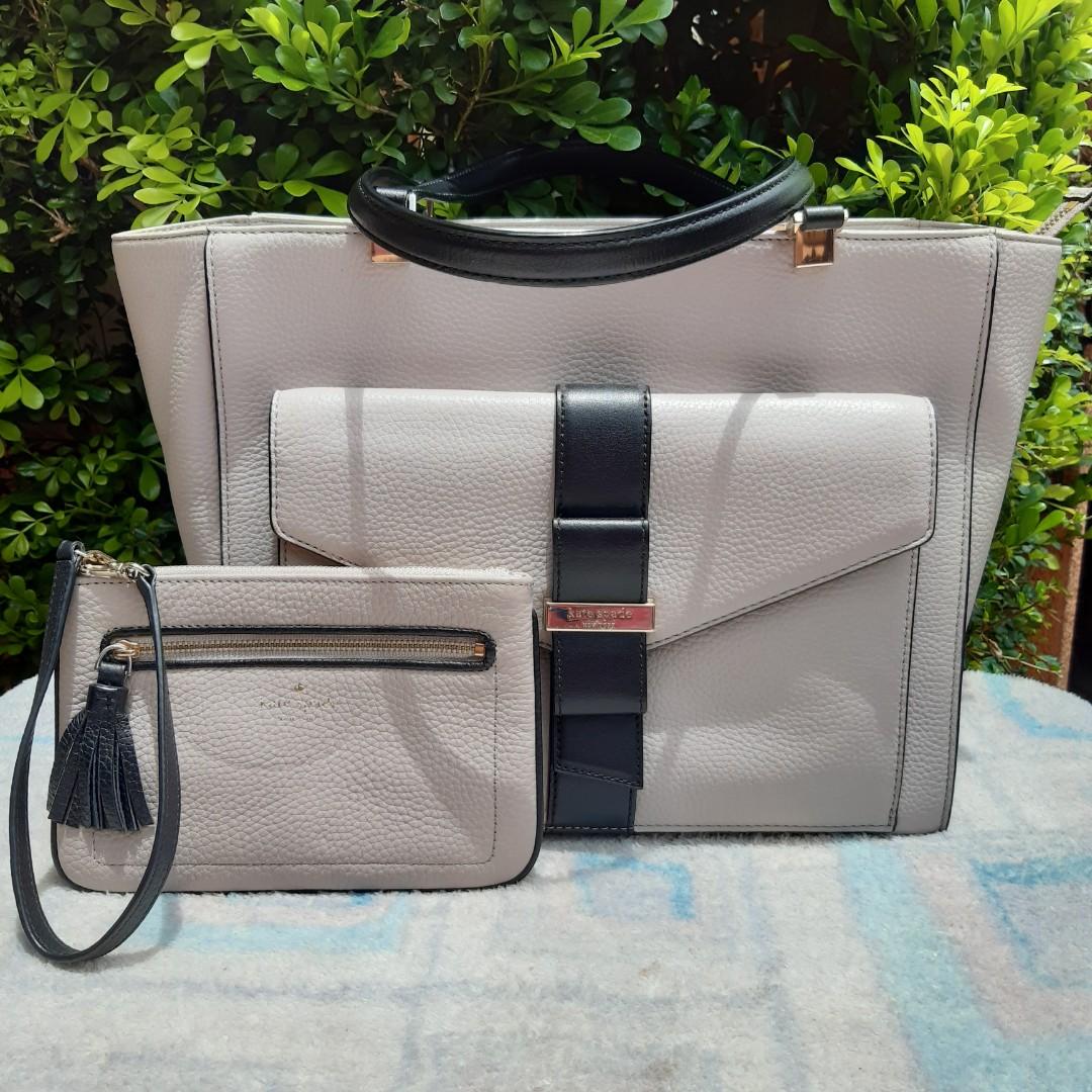 Kate Spade Tote bag with wristlet (Category: Shoulder Bags) located in Antipolo. Submitted by coco_mompreneur (Listing ID 1089080242, Image 1). Description: original preloved very good used condition flaw: may tastas yung inner front pocket.