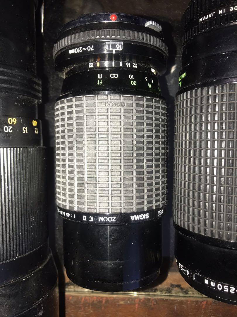 Camera lens (Category: Lens & Kits) located in Tanza. Submitted by cloydscollectionshop (Listing ID 1089257262, Image 3). Description: Lot sale 4pcs camera lens Tamron zoom 200-400mm Sigma zoom 70-210mm Tokina AT-X 50-250mm Canon zoom fd 100-200mm As-is!Not tested Price:5000Php.