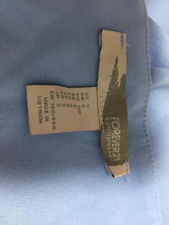 Forever 21 Contemporary Dress (Category: Dresses) located in Taguig. Submitted by camaepen (Listing ID 1089255919, Image 2). Description: Brand: Forever 21 -Contemporary description: spaghetti strap shift dress color: light blue used but not abused in good condition RFS: decluttering.