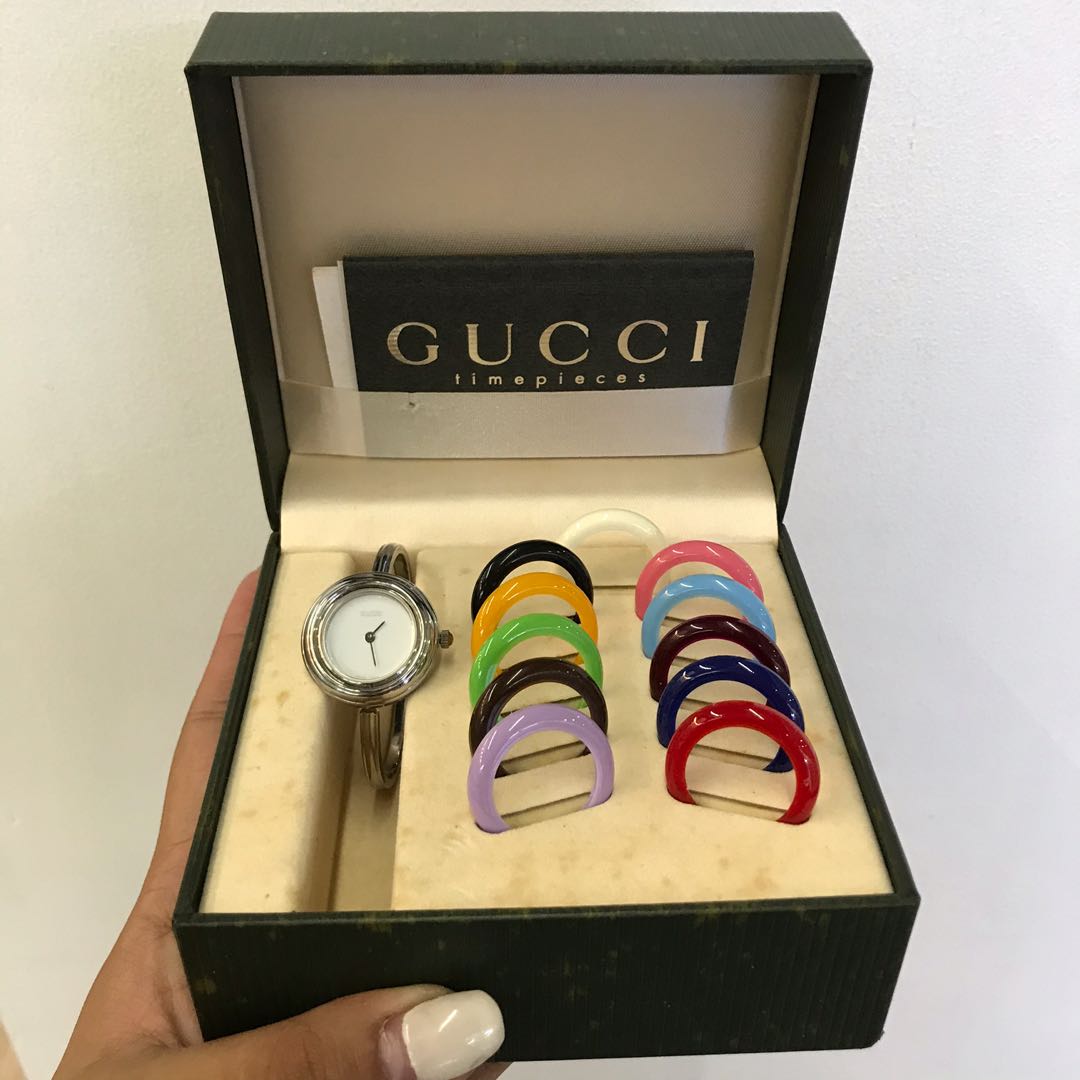 silver gucci bezel watch