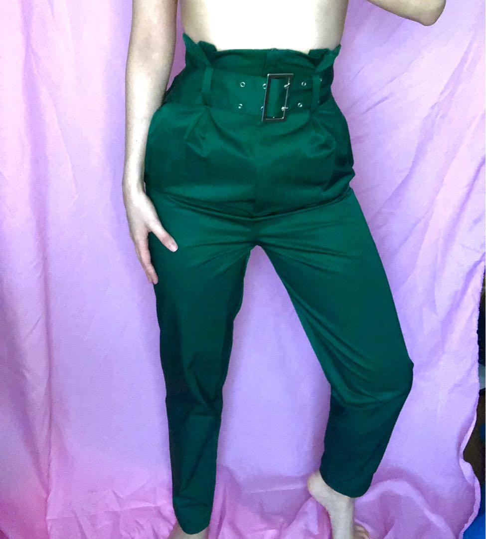 H&M high waisted green groovy pants (Category: Other Bottoms) located in Makati City. Submitted by skrunkly (Listing ID 1089401015, Image 1). Description: An old favorite that elevates ANY outfit and adds a quirky but sophisticated edge. Top is pleated, pant tapers down to a slim cigarette-ish cut at the ankles Fits max 26 waist, 35 hips..