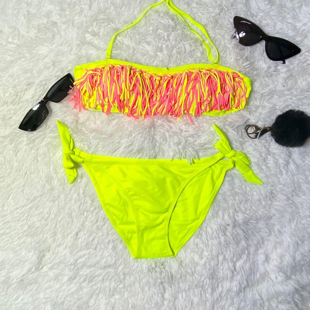 Neon Green String Two Piece Swimsuit (Category: Bikinis & Swimsuits) located in Taguig. Submitted by RoseTags (Listing ID 1089494888, Image 2). Description: Brandnew swimsuit with Tag fits small to semi large.