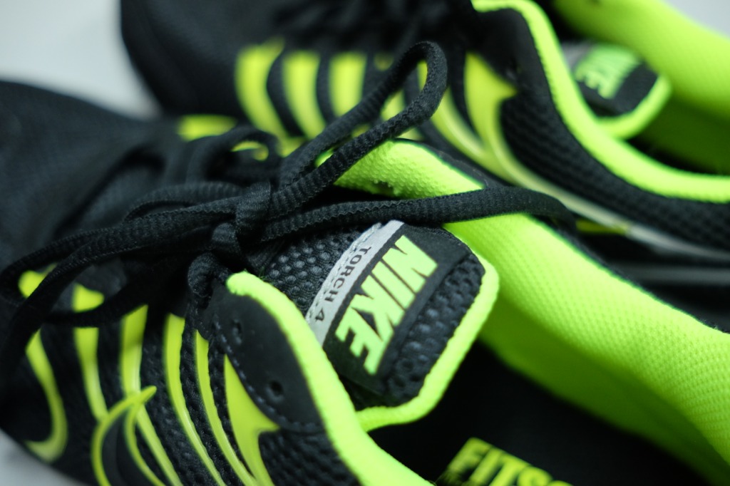 Nike torch 4 black hotsell