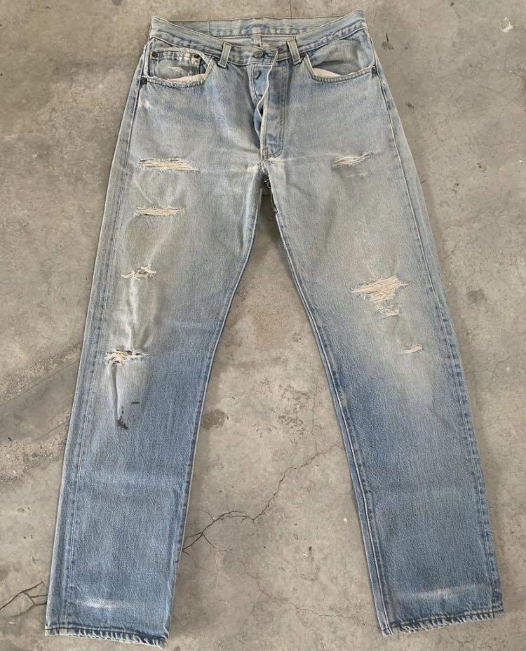 VINTAGE 1980s LEVIS 501 RIPPED DENIM, Men's Fashion, Bottoms, Jeans on  Carousell