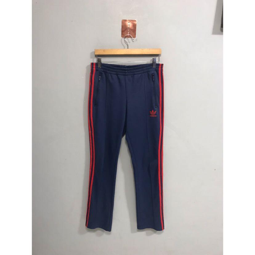 adidas the brand with 3 stripes pants