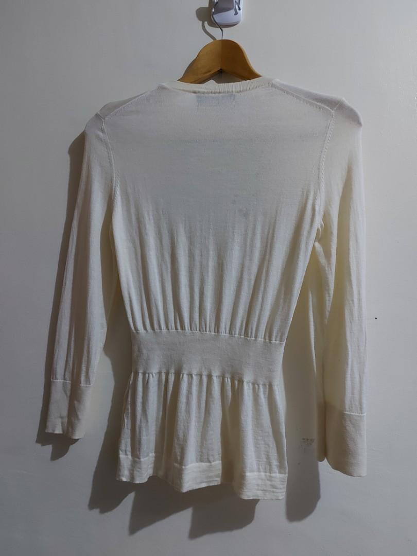 Dolce & Gabbana D&G Top (Category: Luxury Apparel) located in Quezon City. Submitted by zoekloeonlineshop (Listing ID 1089734709, Image 3). Description: Dolce &Gabbana Top Still in Very good Condition Size: 38 Made In Italy Best Fits Xs to Small 100% Wool Arnpit to Armpit: 16" Length: 24".