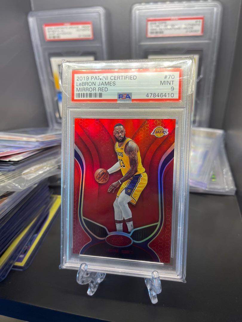 Lebron James PSA 9 (Category: Game Gift Cards & Accounts) located in Pasig City. Submitted by cassiddy (Listing ID 1089621557, Image 2). Description: Lebron James! Prizm raw: 3k Express lane: 2.7k Optic: 2.7k Prizm: 6k Certified Red: 9k Pink panini raw: 300 Revo: 1k Pm me!.