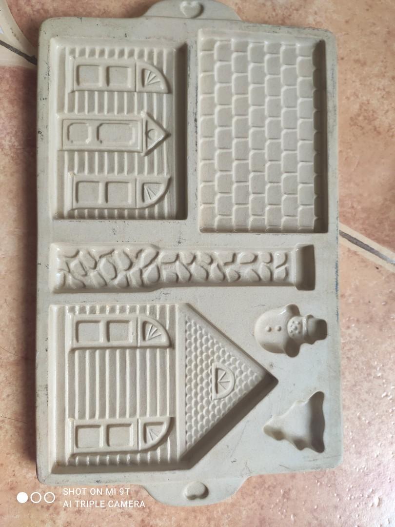 Vintage Pampered Chef Gingerbread House Moulder (Category: Bakeware) located in Davao. Submitted by papa1919 (Listing ID 1089597203, Image 1). Description: Rare & collectible. Made in USA. 3 pieces available..