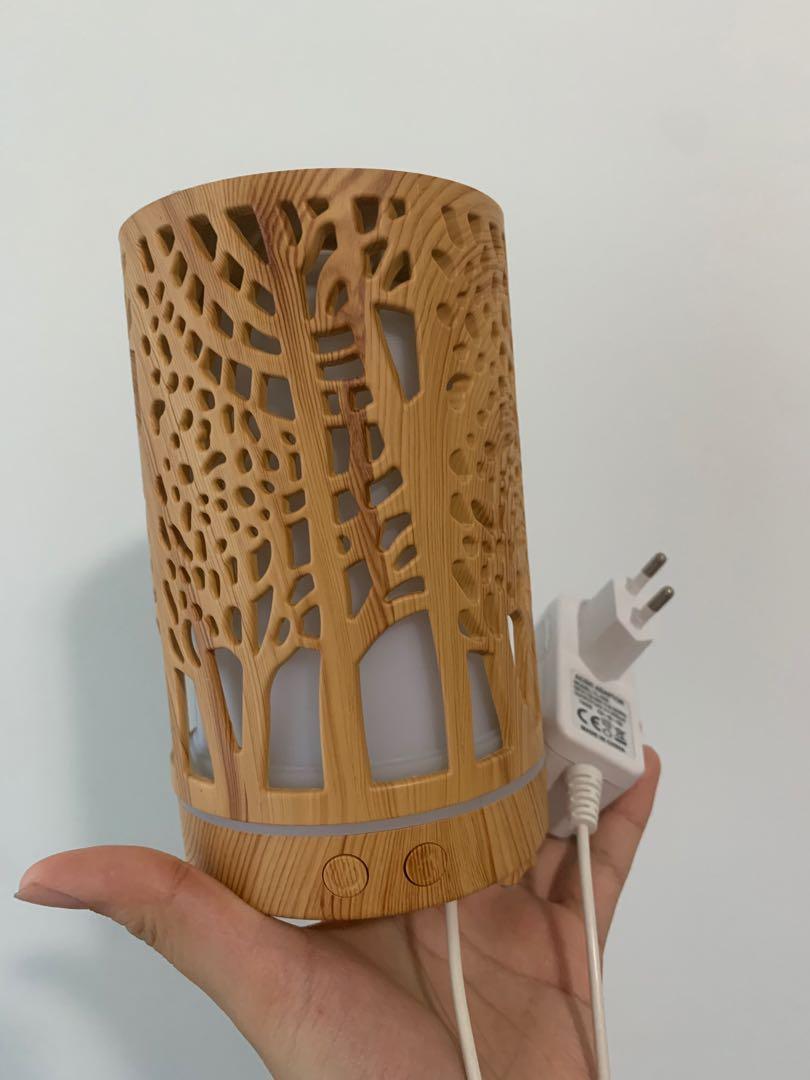 Wood diffuser (Category: Home Fragrance) located in Singapore. Submitted by dandeliondust (Listing ID 1089693205, Image 1). Description: Used a couple of times, no issues works well Decluttering at home, should go to someone who can use it! Able to change light to different colour options Meet ups at my convenience!.