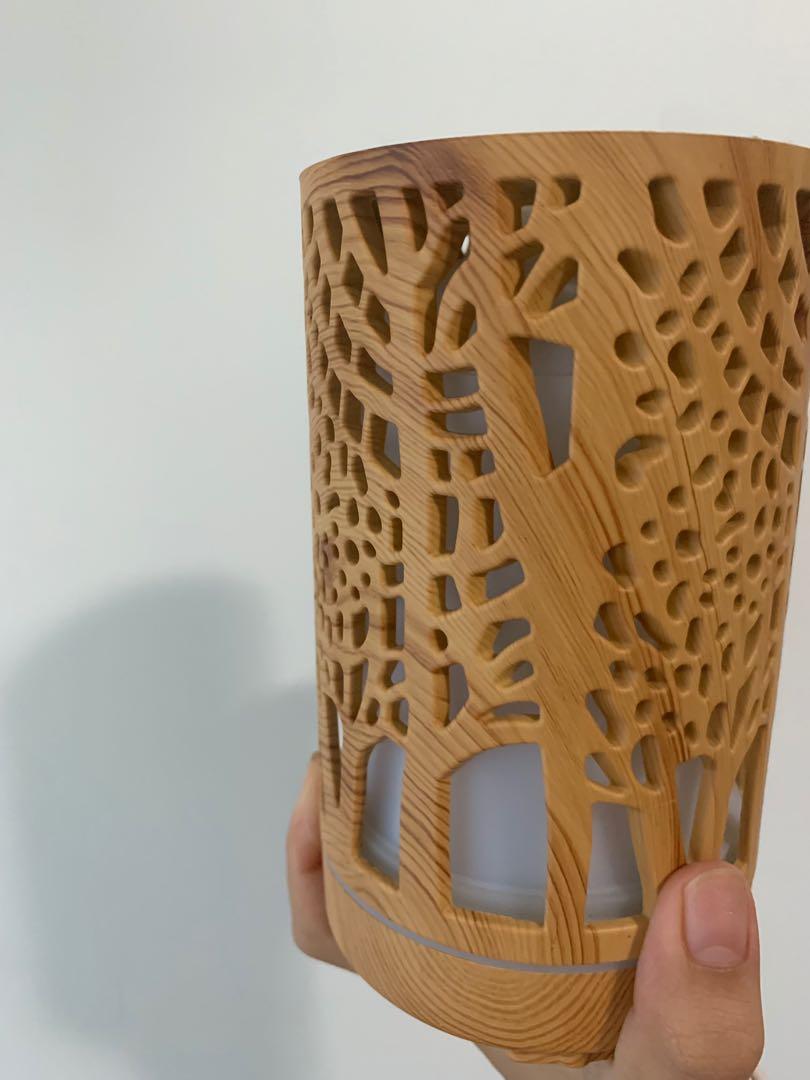Wood diffuser (Category: Home Fragrance) located in Singapore. Submitted by dandeliondust (Listing ID 1089693205, Image 2). Description: Used a couple of times, no issues works well Decluttering at home, should go to someone who can use it! Able to change light to different colour options Meet ups at my convenience!.