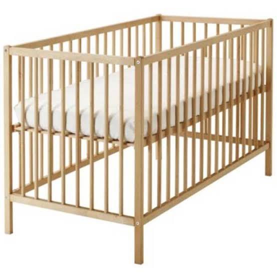 Ikea wood hot sale cot