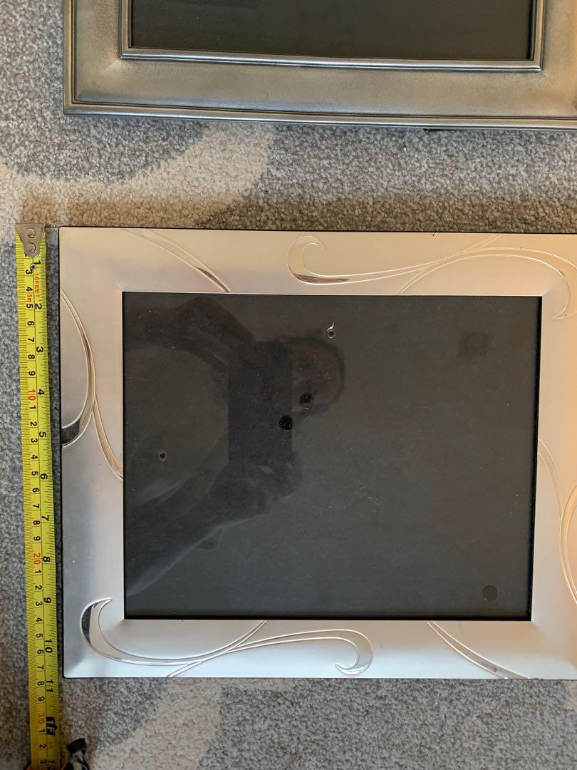 Solid silver picture frames (Category: Accessories) located in Singapore. Submitted by rhinch (Listing ID 1090016069, Image 3). Description: Silver picture frames - very good condition .