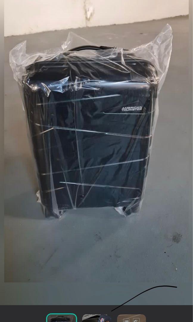 American Tourister 20 inch wrap bag Hobbies Toys Travel Luggage on Carousell