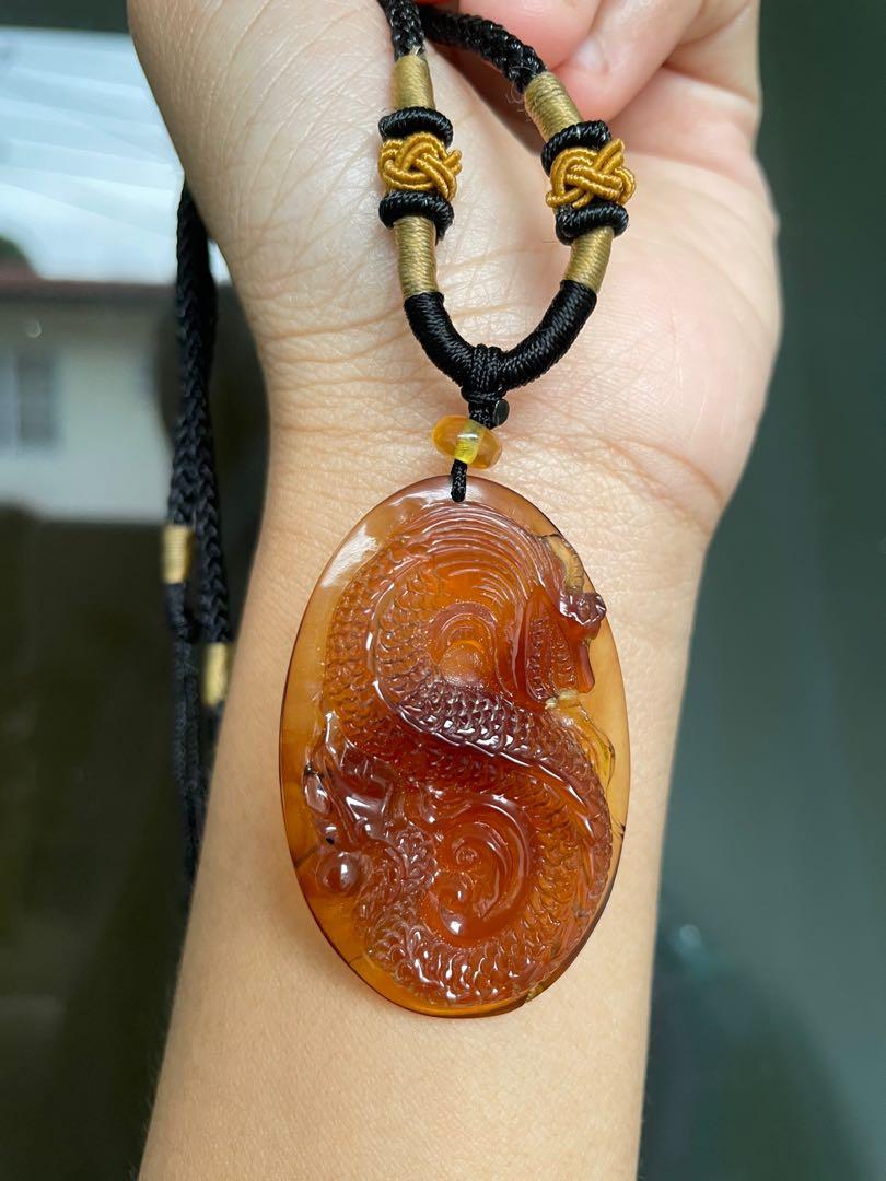 Carved amber new arrivals jewelry