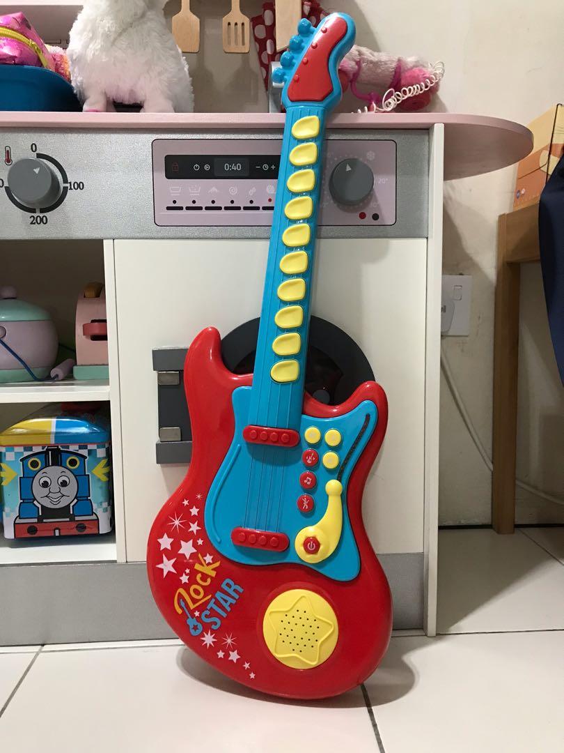 Toy guitar tesco deals
