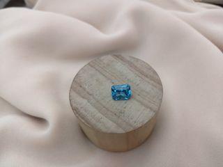 Loose Blue Topaz 7x9. 5mm 5ct.  With silver setting white gold dipped