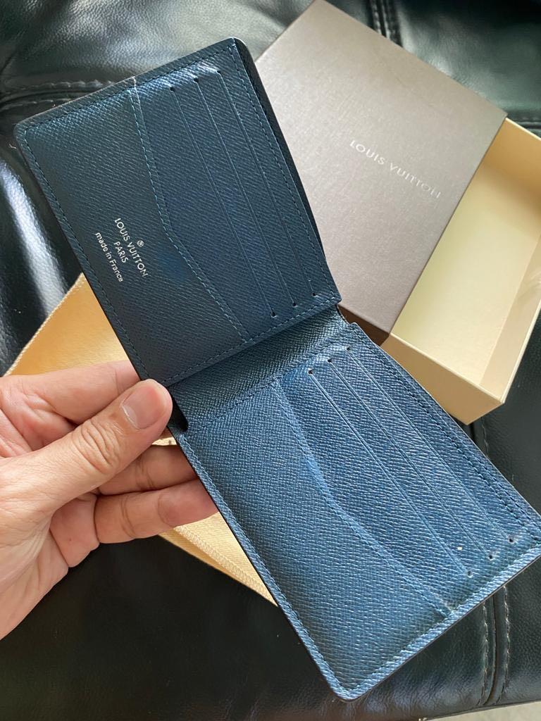 LV taiga bleu marine leather wallet, Luxury, Bags & Wallets on
