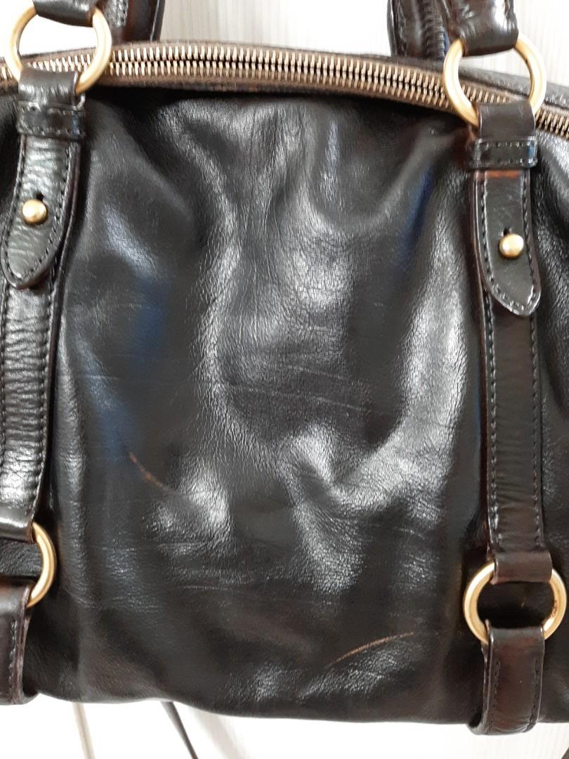Miumiu leather sling (Category: Luxury Bags & Wallets) located in Manila. Submitted by poyeesy (Listing ID 1090338635, Image 3). Description: original miumiu leather sling bag..